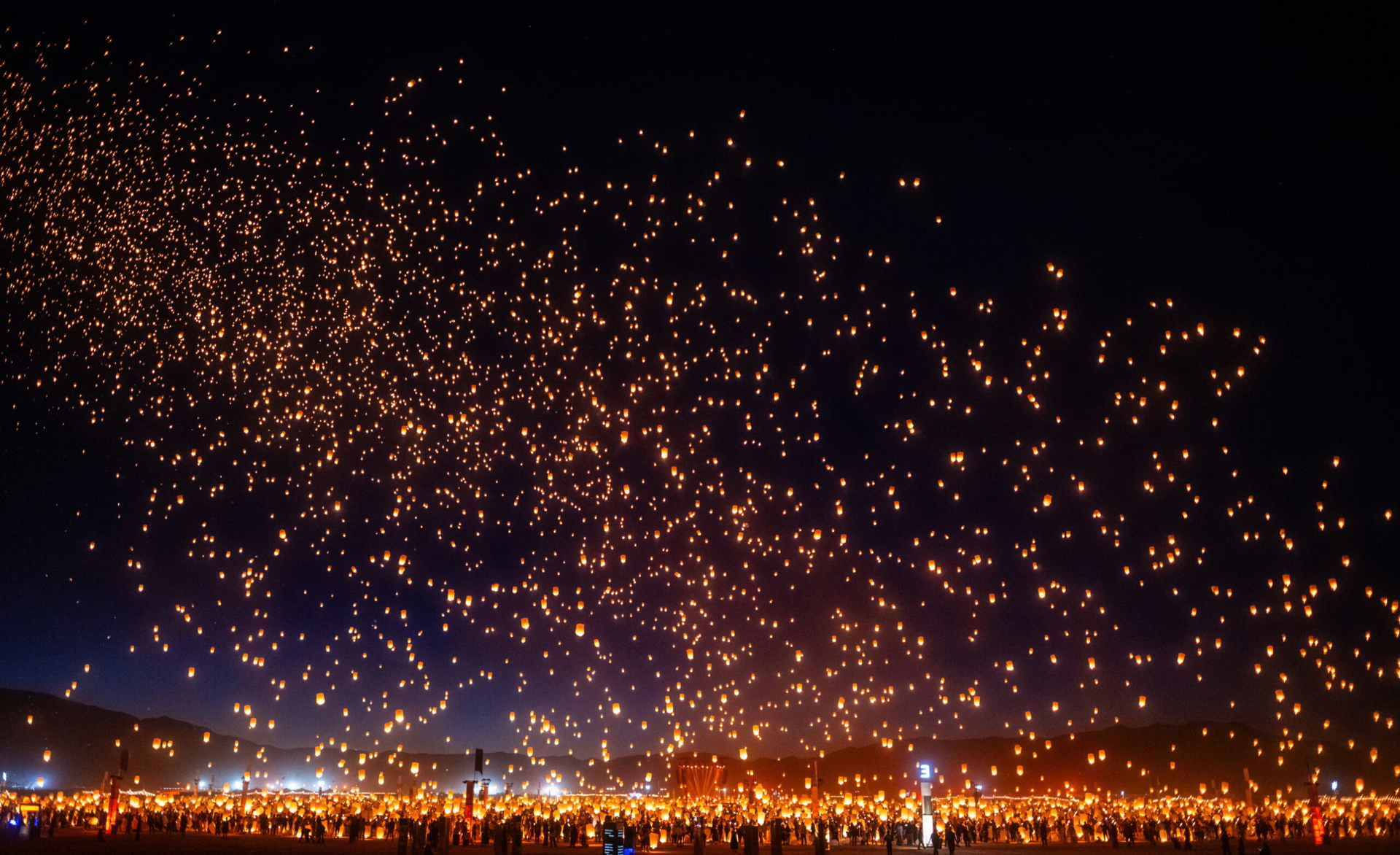 RiSE Festival — The Release: The climactic lantern release is presented with full-bleed night photography — t